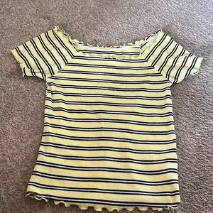 It is a little crop top and have ruffles on the ends